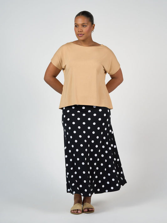Image of a model wearing Skirts. Product name - Jackson Bamboo A-Line Maxi Skirt Polka Dot in Polka Dot colour by brand - Lou Lou