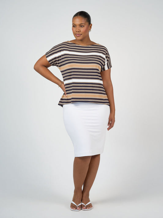 Image of a model wearing Skirts. Product name - Midi Bamboo Whitney Tube Skirt White in White colour by brand - Lou Lou