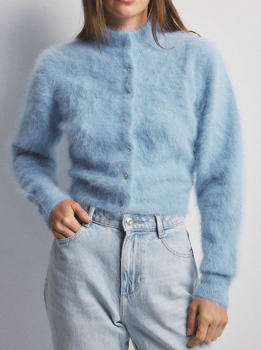 Image of a model wearing Outerwear. Productname: WORLD OF NOMADS BELLA CASHMERE CARDIGAN in Sky colour by brand - World Of Nomads