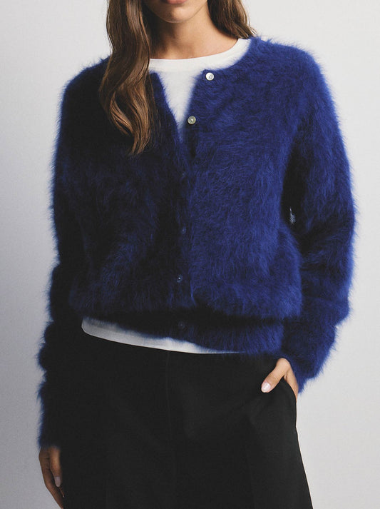 Image of a model wearing Outerwear. Productname: WORLD OF NOMADS FRANKIE CREW NECK CASHMERE CARDIGAN in Navy colour by brand - World Of Nomads