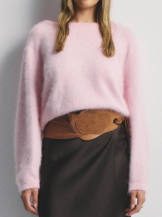 Image of a model wearing Outerwear. Productname: WORLD OF NOMADS STELLA BOAT NECK CASHMERE KNIT in Rosewater colour by brand - World Of Nomads