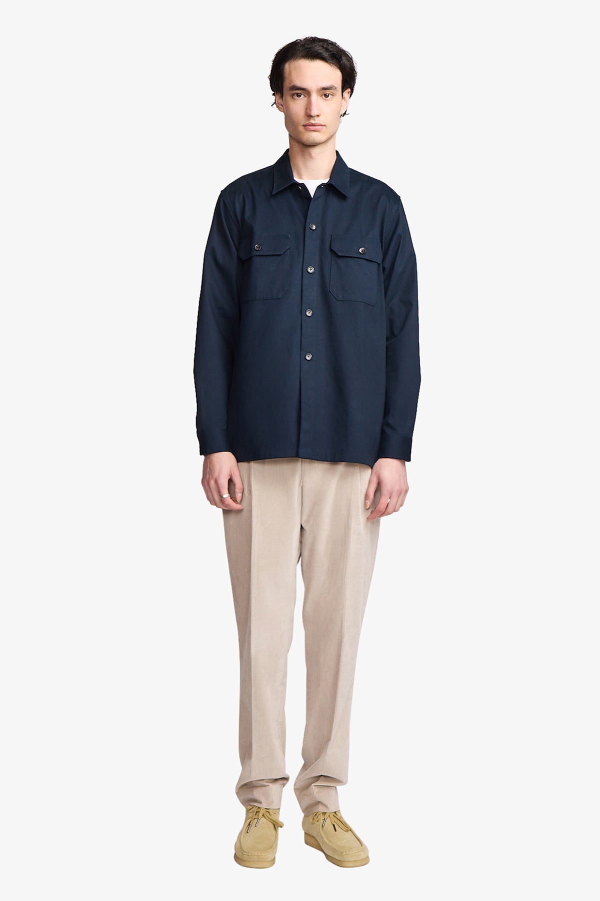 Image of a model wearing Outerwear. Productname: Anthony Squires Wright navy overshirt in Blue colour by brand - Anthony Squires