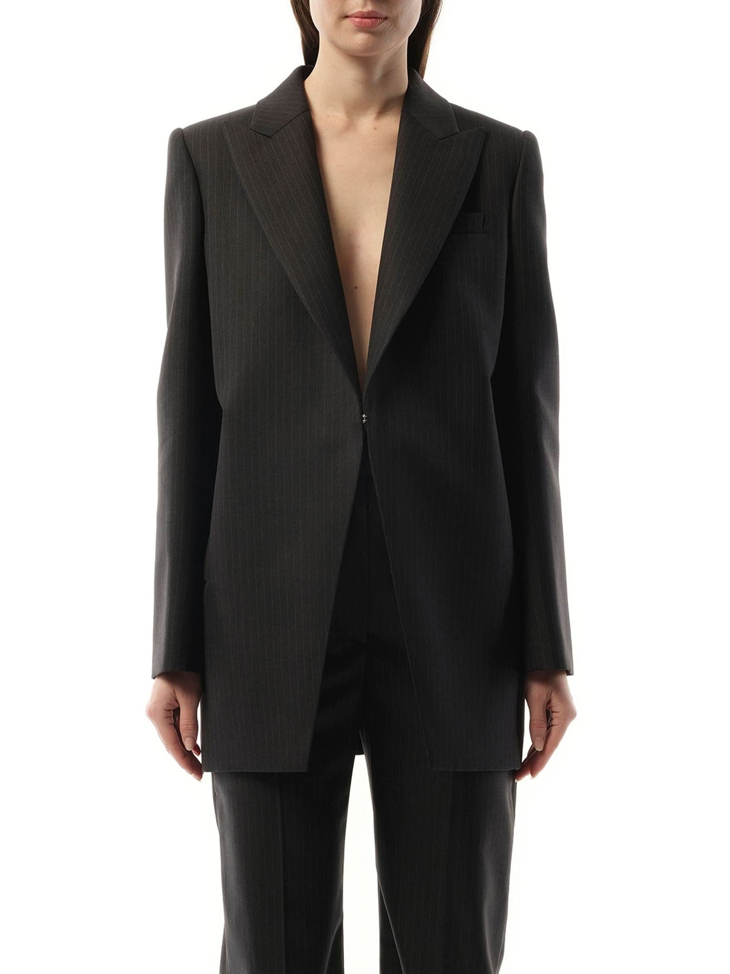 Image of a model wearing Outerwear. Productname: ALEXANDER MCQUEEN Cut Away Long Jacket in Grey colour by brand - ALEXANDER MCQUEEN