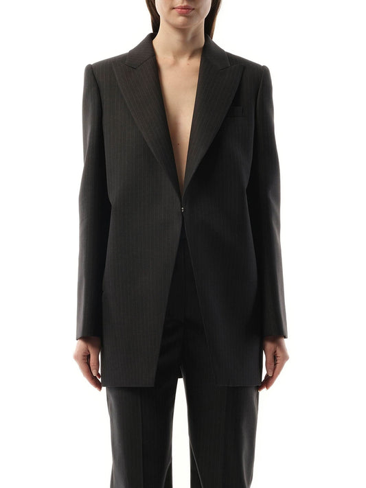 Image of a model wearing Outerwear. Productname: ALEXANDER MCQUEEN Cut Away Long Jacket in Grey colour by brand - ALEXANDER MCQUEEN