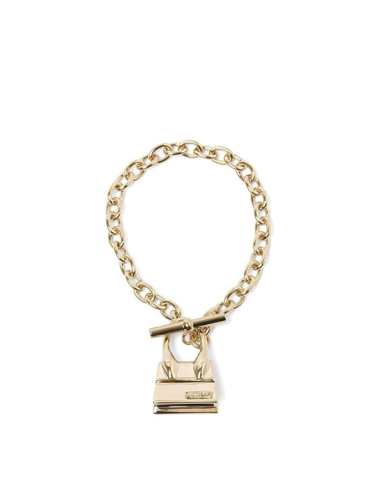 Image of Bracelets. Productname: JACQUEMUS Le Bracelet Chiquito Bar in GOLD colour by brand - JACQUEMUS