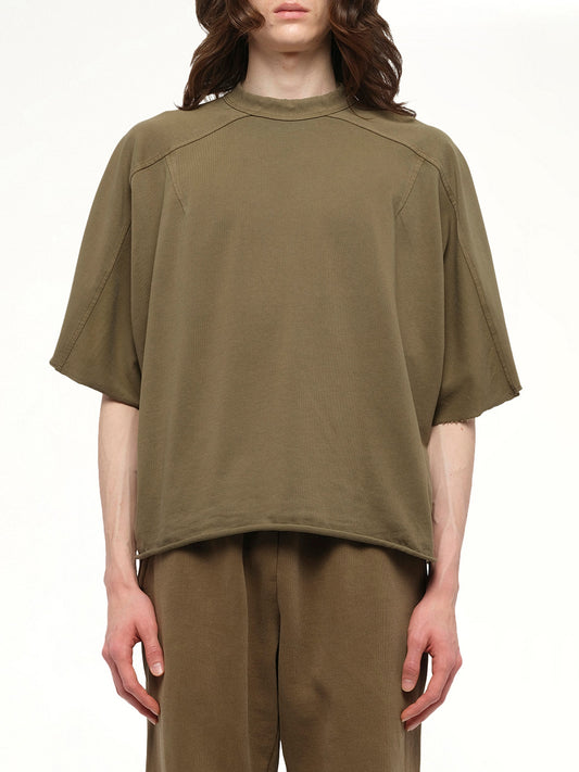 Image of a model wearing Tops. Productname: ENTIRE STUDIOS Heavy Dart T-Shirt in Military colour by brand - ENTIRE STUDIOS