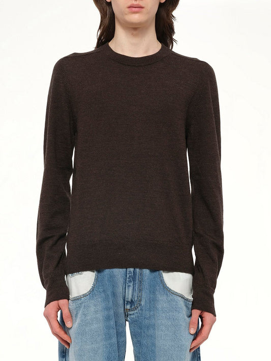 Image of a model wearing Outerwear. Product name - Gauge 12 Knit Sweater in Brown colour by brand - MAISON MARGIELA