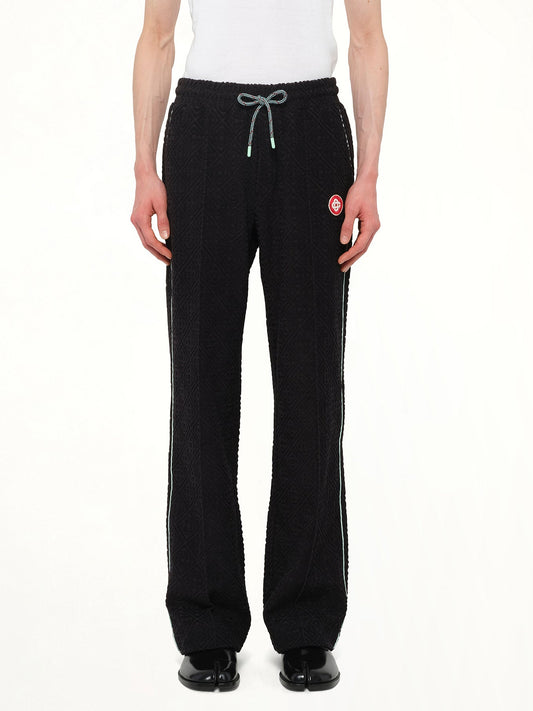 Image of a model wearing Pants. Productname: CASABLANCA Towelling Jogger in BLACK colour by brand - CASABLANCA