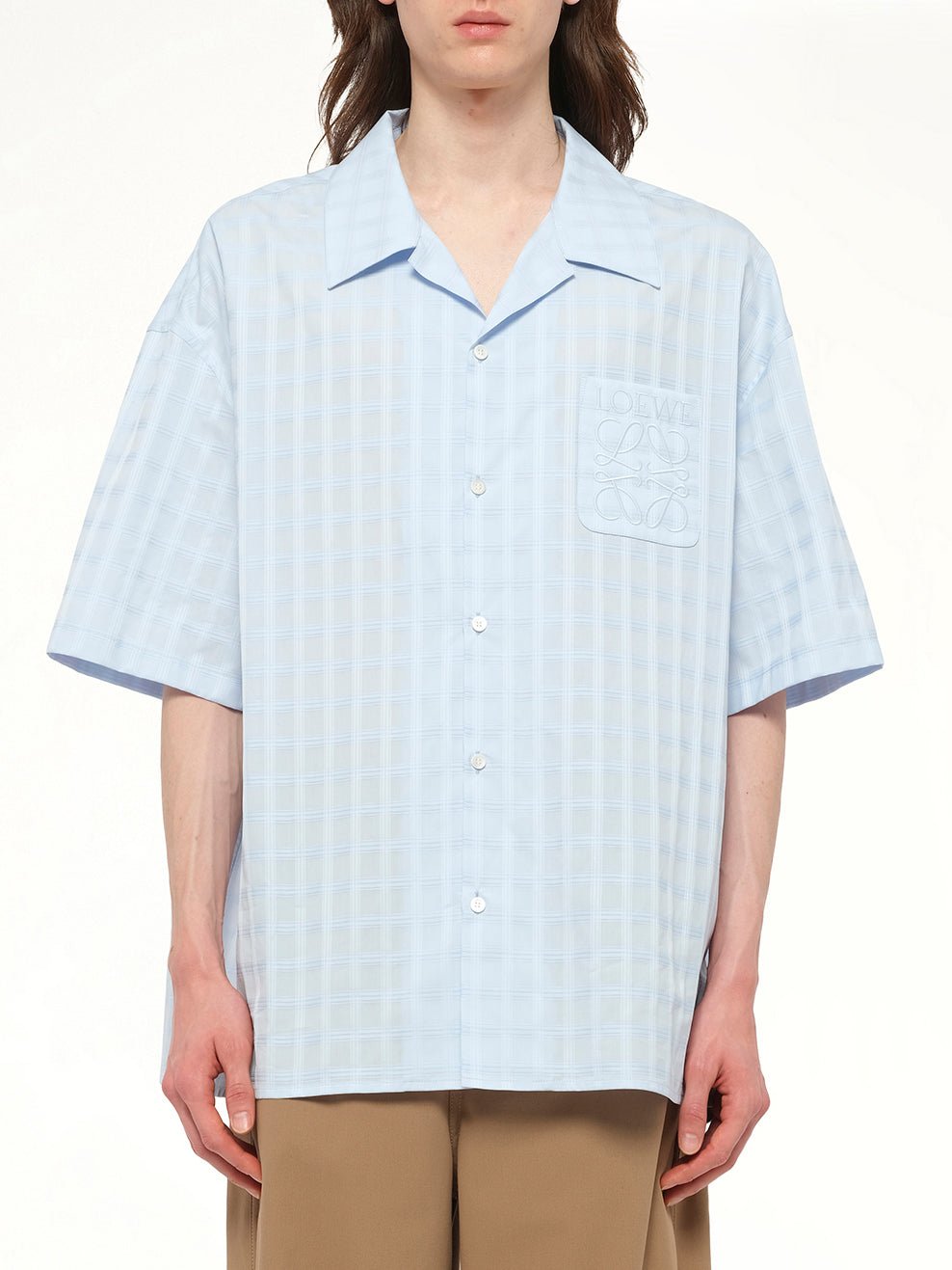 Image of a model wearing Shorts. Productname: LOEWE Short Sleeve Shirt in Blue colour by brand - LOEWE
