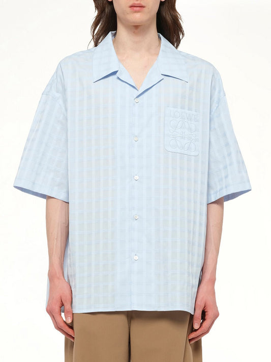 Image of a model wearing Shorts. Productname: LOEWE Short Sleeve Shirt in Blue colour by brand - LOEWE