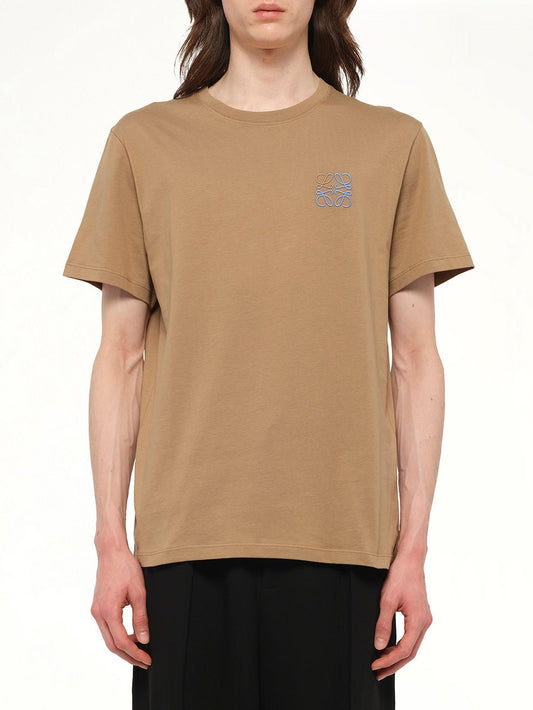 Image of a model wearing Tops. Productname: LOEWE Anagram Logo T-Shirt in Camel colour by brand - LOEWE
