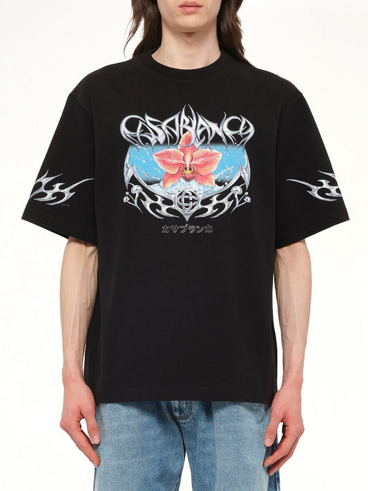 Image of a model wearing Tops. Productname: CASABLANCA Blades Printed Oversized T-Shirt in Black colour by brand - CASABLANCA