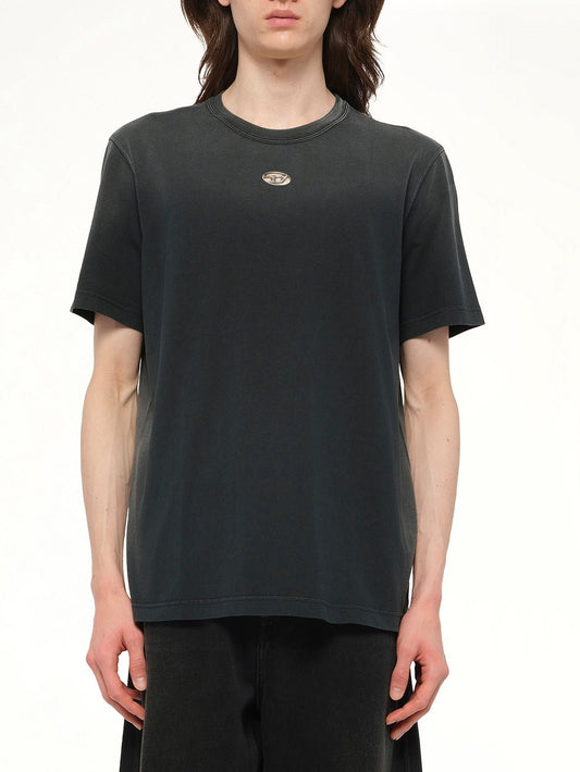 Image of a model wearing Tops. Productname: DIESEL T-ADJUST-T1 T-Shirt in Black colour by brand - DIESEL