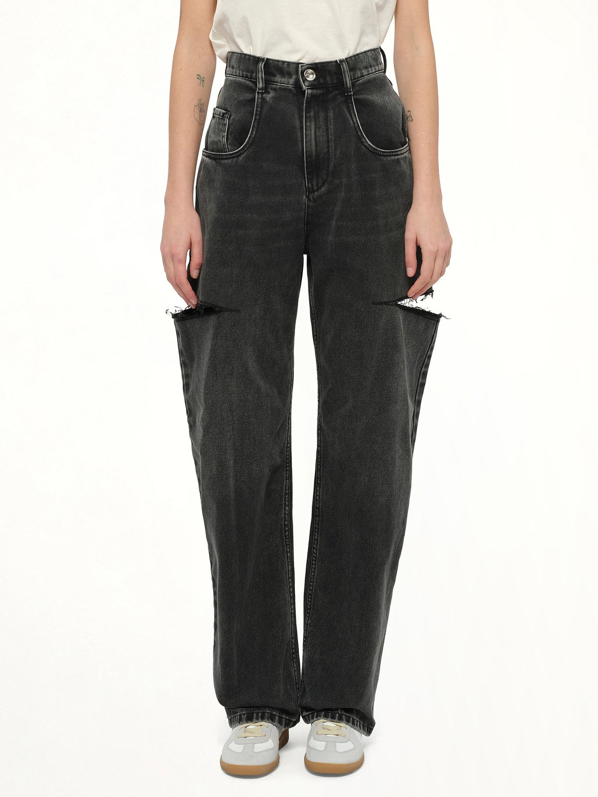 Image of Jeans. Product name - Slash Loose Fit Denim Jeans in Black colour by brand - MAISON MARGIELA