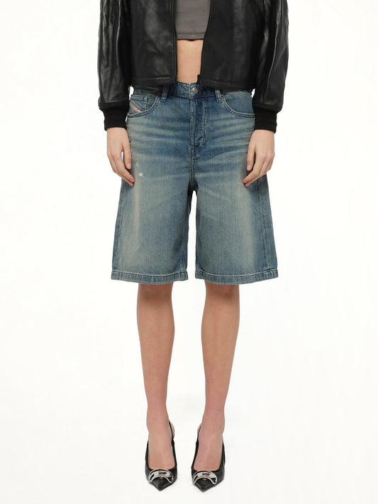 Image of a model wearing Shorts. Productname: DIESEL DE-SIRE-SHORT Denim Shorts in Blue colour by brand - DIESEL