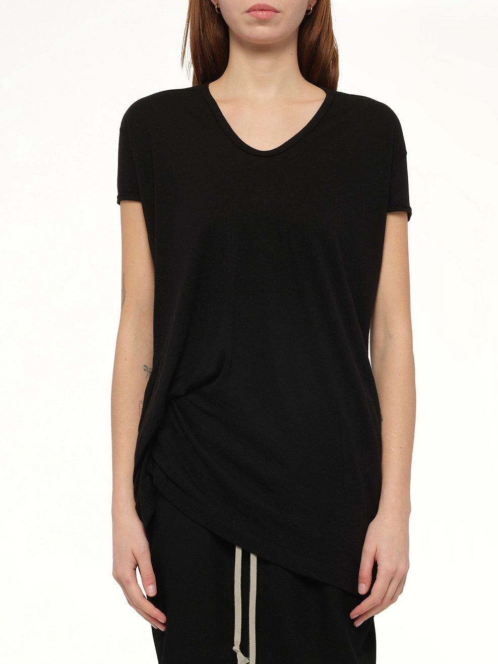 Image of a model wearing Tops. Productname: RICK OWENS Hiked T in Black colour by brand - RICK OWENS