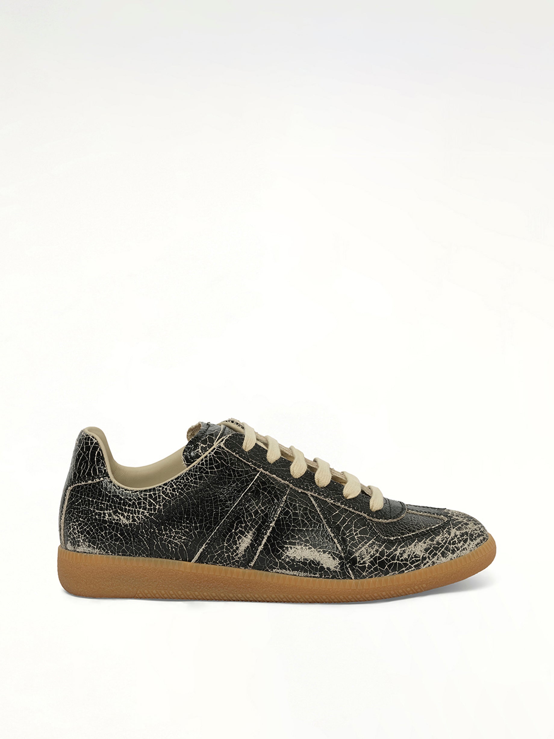 Image of Sneakers. Product name - Replica Crackling Leather Sneaker in Black colour by brand - MAISON MARGIELA