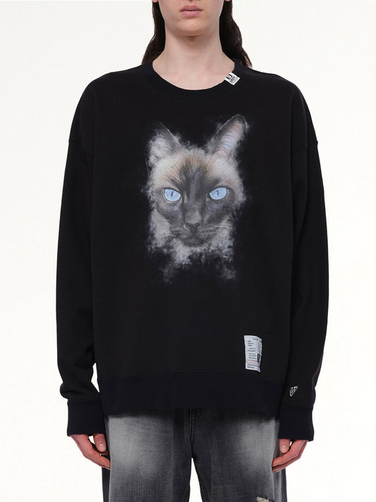 Image of a model wearing Outerwear. Productname: MAISON MIHARA YASUHIRO Cat Printed Pullover in BLACK colour by brand - MAISON MIHARA YASUHIRO