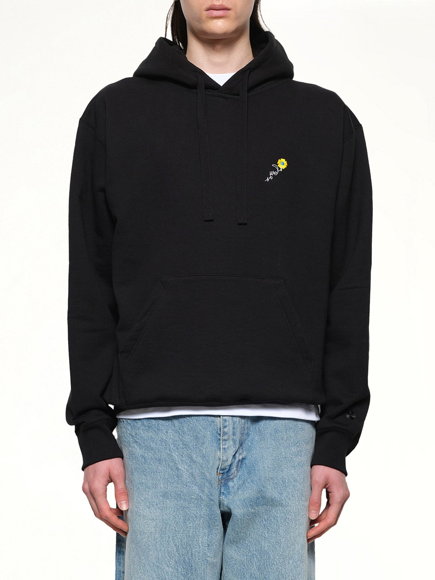 Image of a model wearing Outerwear. Productname: VOWELS Floral Embroidered Hoodie in Black colour by brand - VOWELS