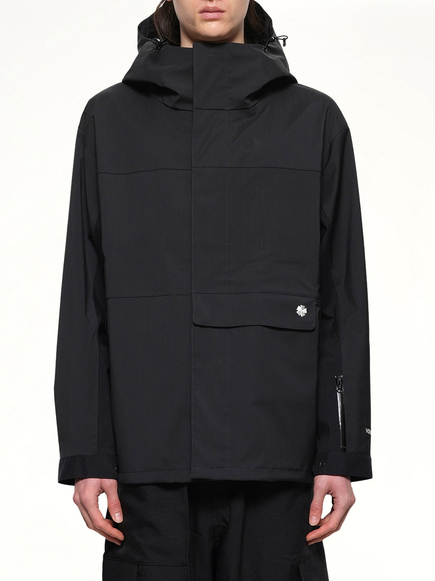 Image of a model wearing Outerwear. Productname: VOWELS Shell Jacket in Black colour by brand - VOWELS