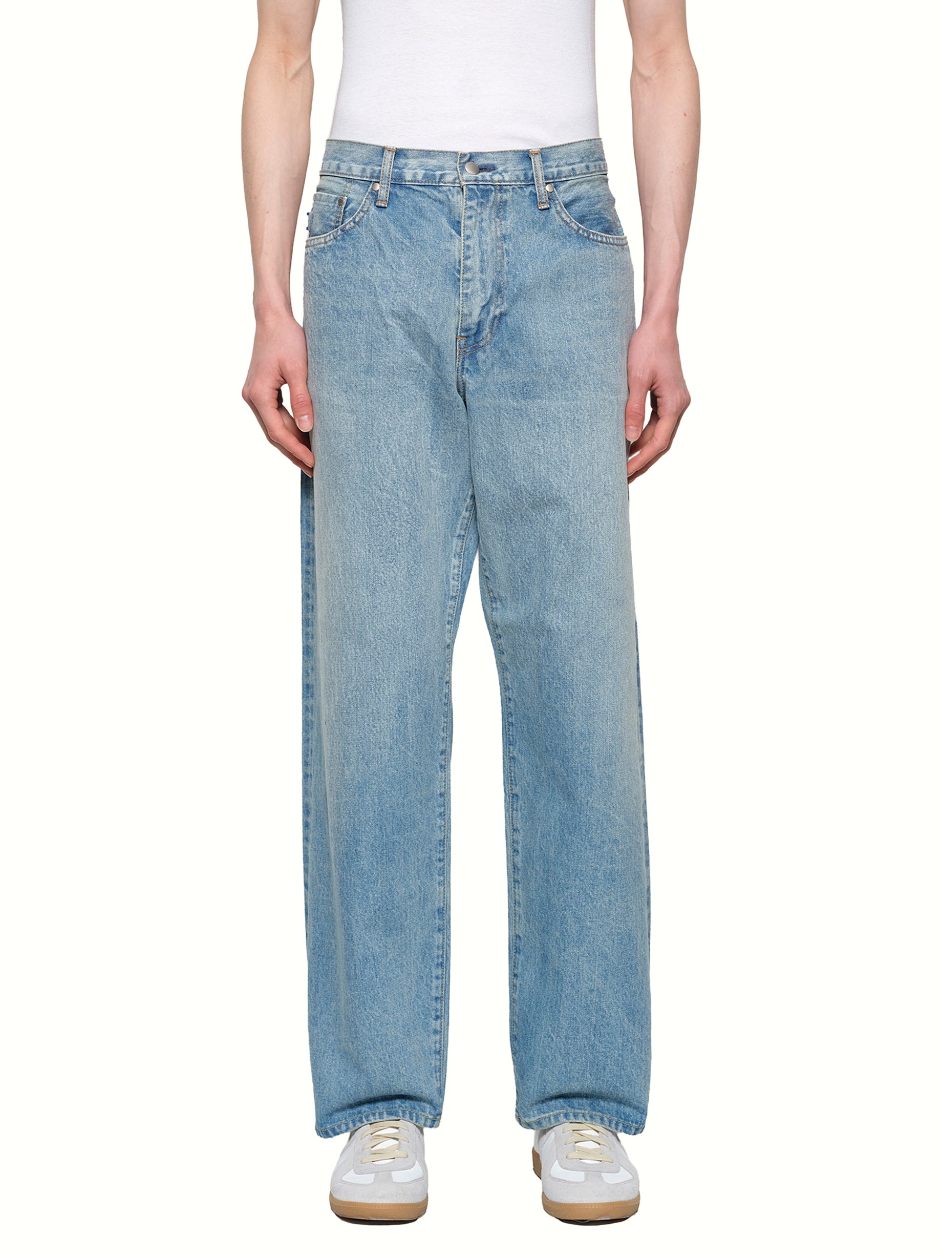Image of a model wearing Denim. Productname: VOWELS Baggy Fit Denim in Stonewashed Indigo colour by brand - VOWELS