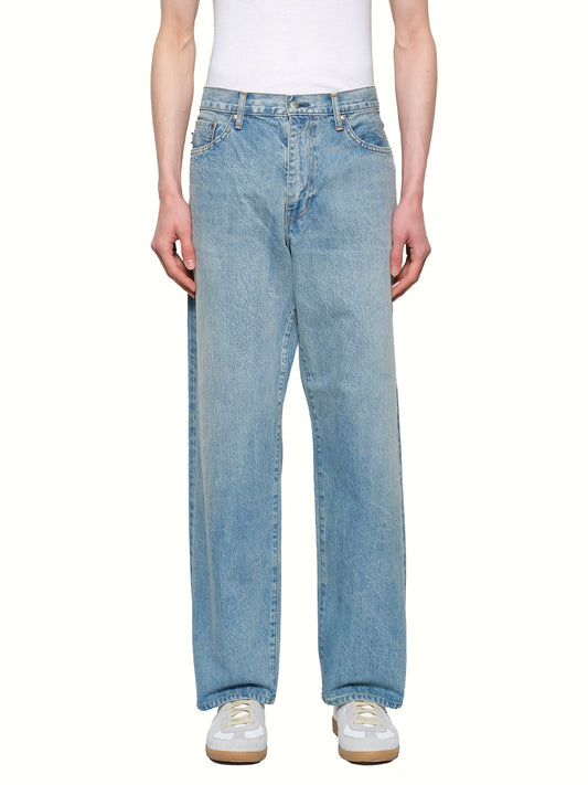 Image of a model wearing Denim. Productname: VOWELS Baggy Fit Denim in Stonewashed Indigo colour by brand - VOWELS