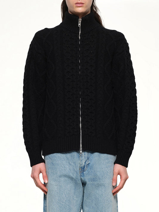 Image of a model wearing Tops. Productname: VOWELS Cable Knit Zip Up in Black colour by brand - VOWELS