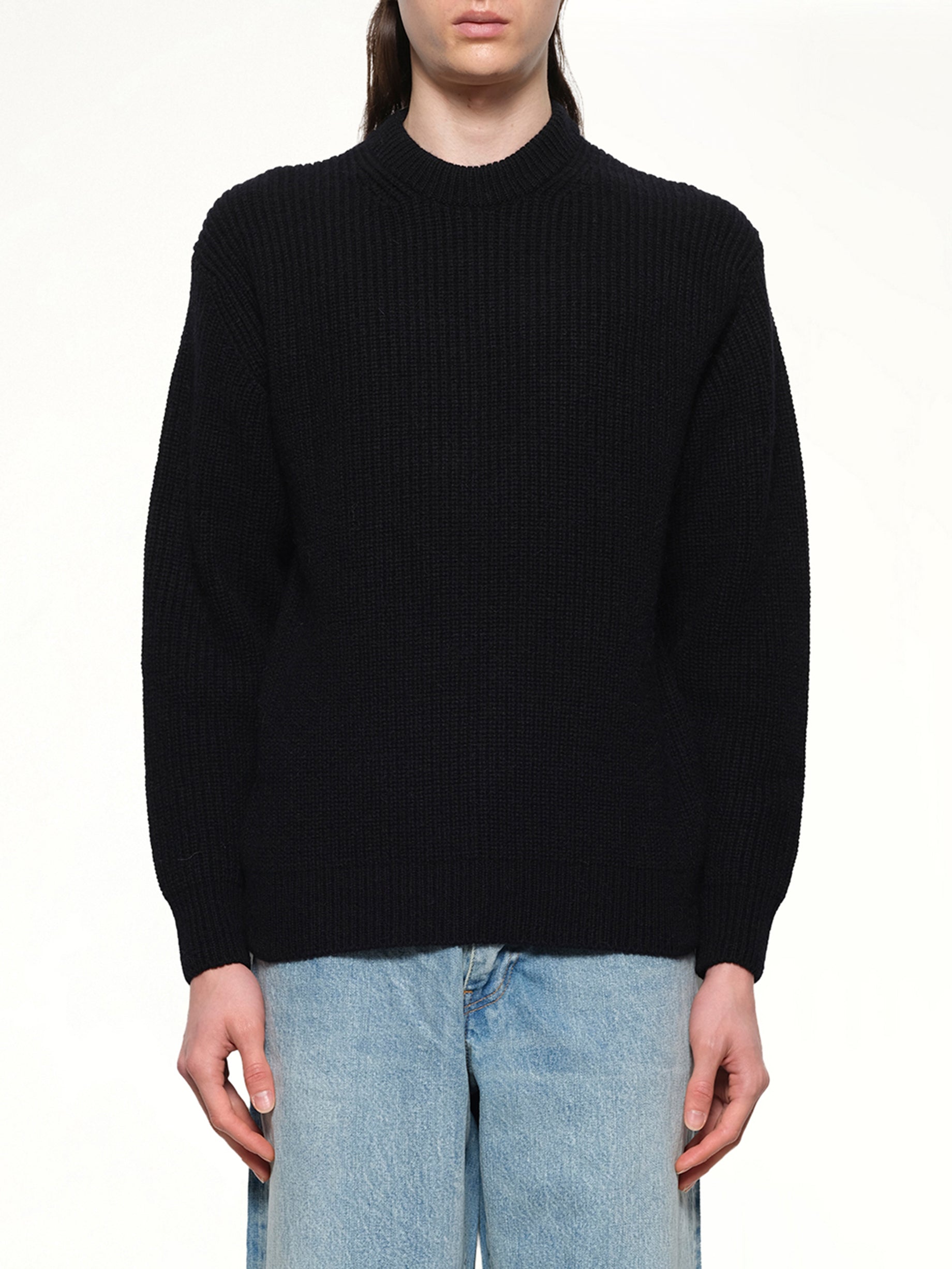 Image of a model wearing Tops. Productname: VOWELS Baby Alpaca Knit in Black colour by brand - VOWELS
