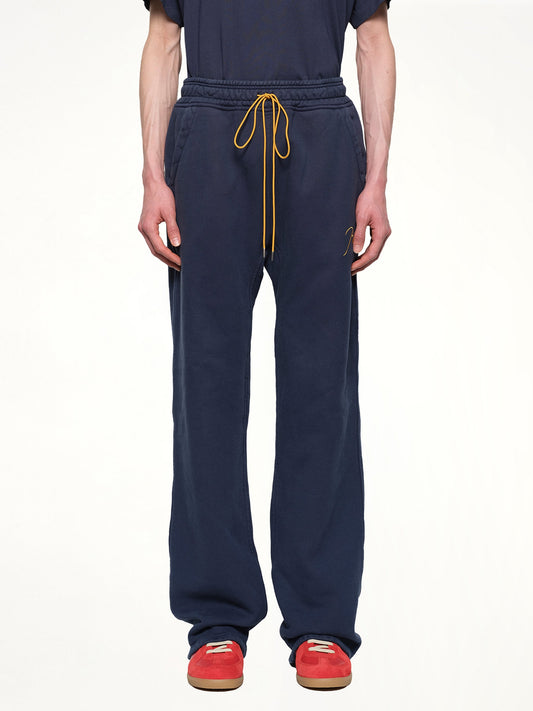 Image of a model wearing Pants. Productname: RHUDE Classique Sweatpant in NAVY colour by brand - RHUDE