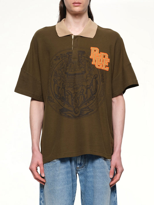 Image of a model wearing Tops. Productname: RHUDE Scramble Logo Stamp Polo in GREEN colour by brand - RHUDE