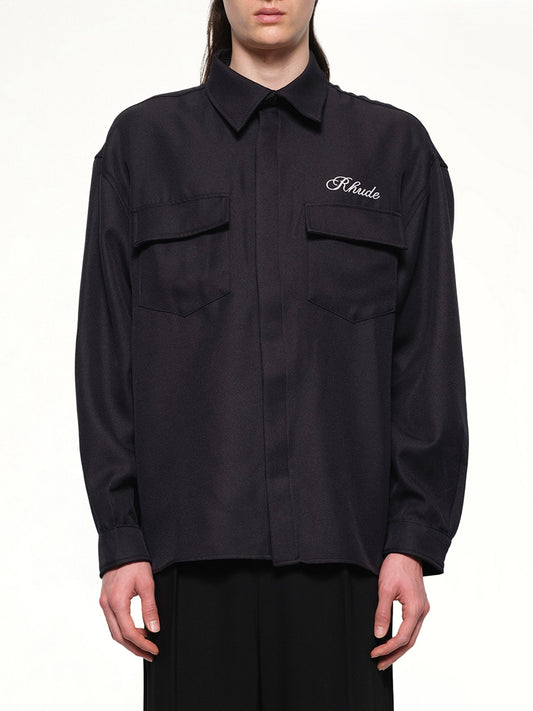 Image of a model wearing Tops. Productname: RHUDE Boxy LS Work Shirt in BLACK colour by brand - RHUDE
