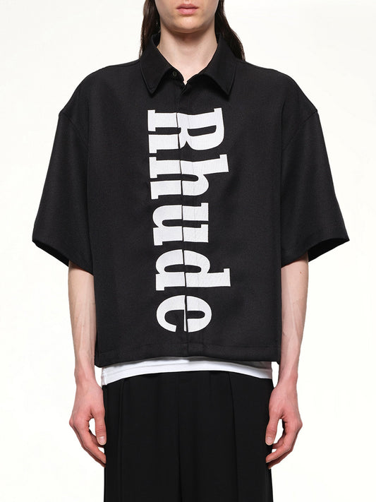 Image of a model wearing Tops. Productname: RHUDE Center Logo Button Up Shirt in BLACK/WHITE colour by brand - RHUDE