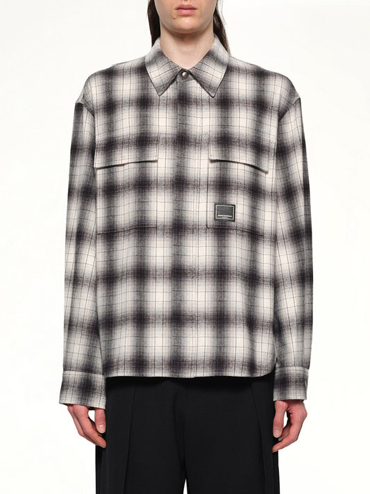 Image of a model wearing Tops. Productname: WOOYOUNGMI Logo Patch Check Shirt in BLACK colour by brand - WOOYOUNGMI