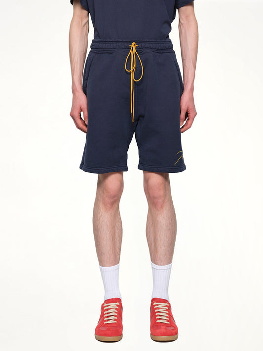 Image of a model wearing Shorts. Productname: RHUDE Classique Sweatshort in NAVY colour by brand - RHUDE