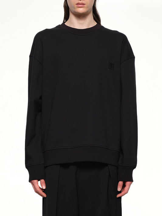 Image of a model wearing Outerwear. Productname: WOOYOUNGMI City Graphic Sweatshirt in BLACK colour by brand - WOOYOUNGMI
