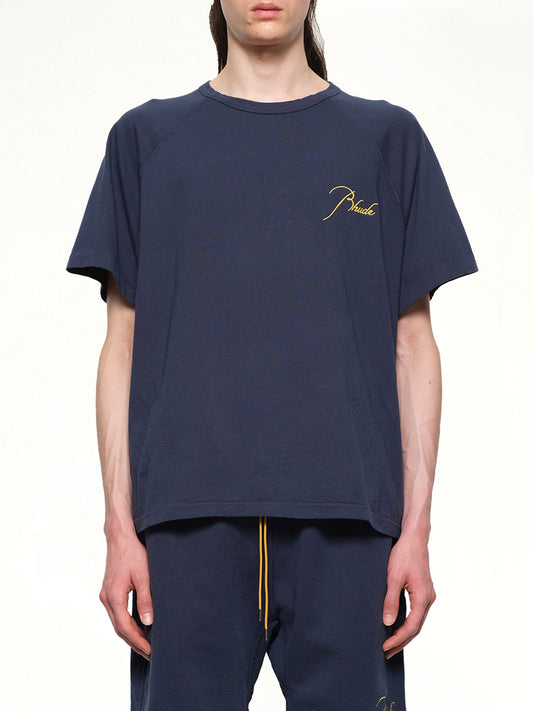 Image of a model wearing Tops. Productname: RHUDE Classique Raglan T-Shirt in NAVY colour by brand - RHUDE