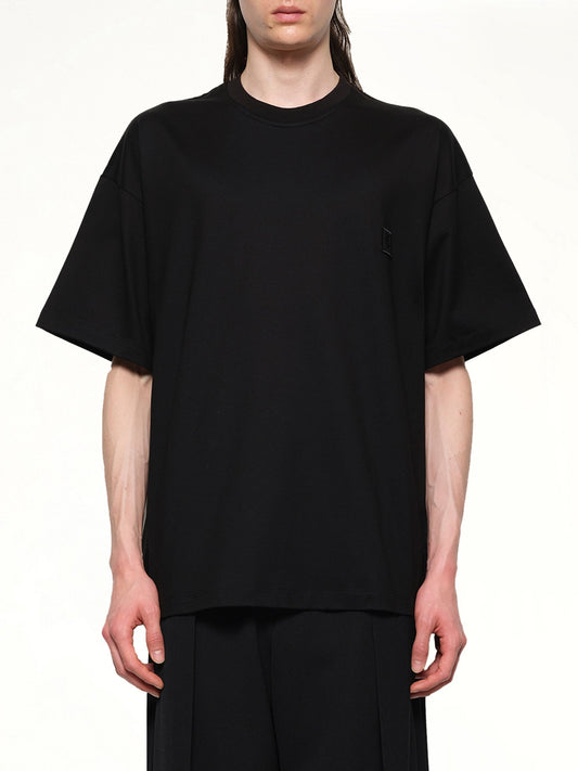 Image of a model wearing Tops. Productname: WOOYOUNGMI City Graphic T-Shirt in BLACK colour by brand - WOOYOUNGMI