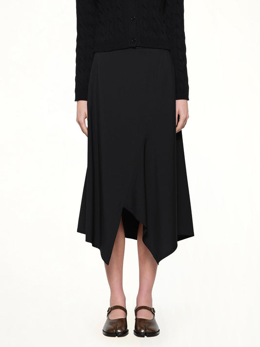 Image of a model wearing Skirts. Product name - Asymmetric Skirt in Black colour by brand - LOEWE