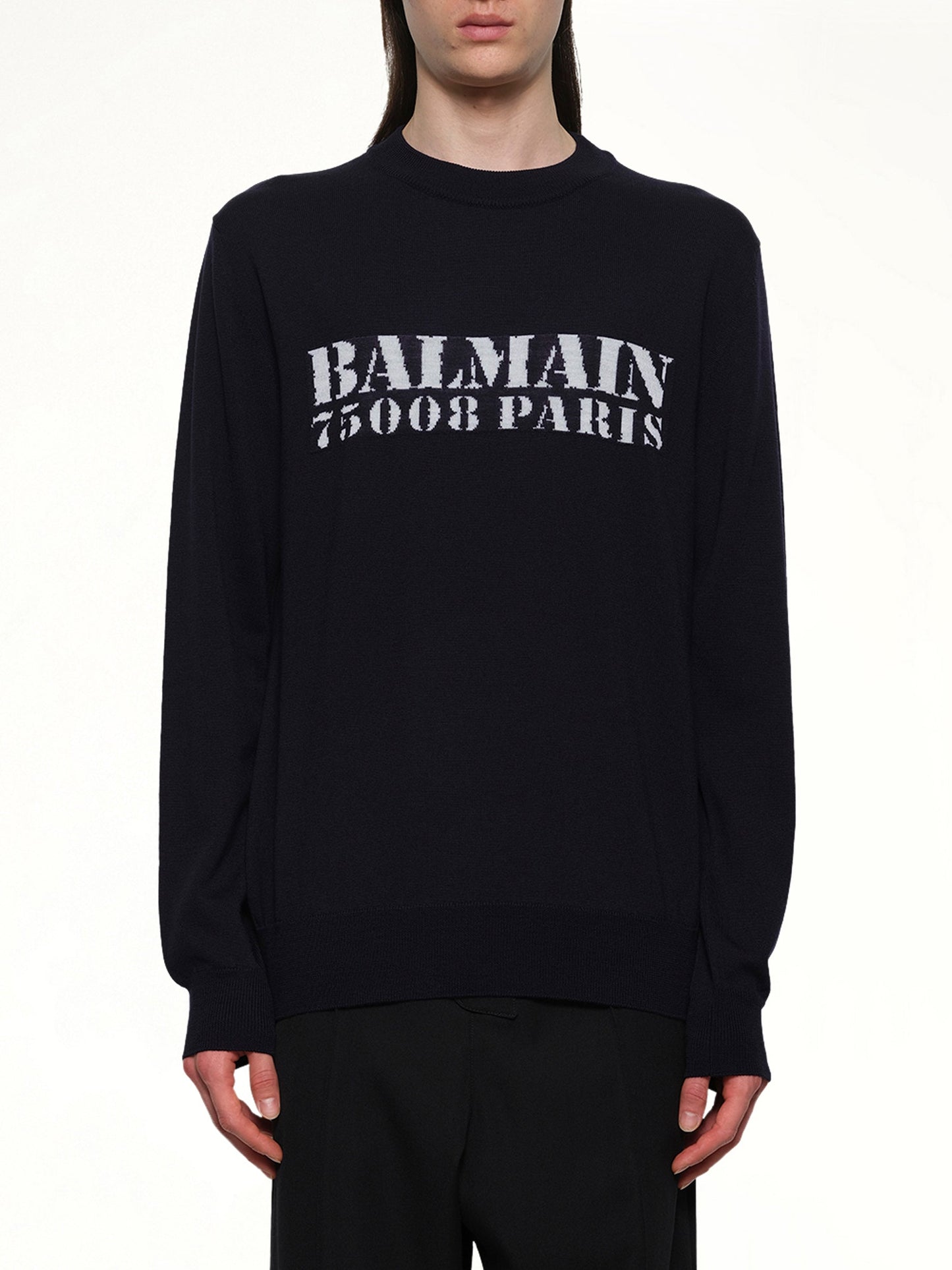 Image of a model wearing Outerwear. Productname: BALMAIN Balmain Big Stamp Knit Sweater in NAVY/WHITE colour by brand - BALMAIN