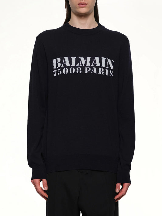 Image of a model wearing Outerwear. Product name - Balmain Big Stamp Knit Sweater in Navy colour by brand - BALMAIN
