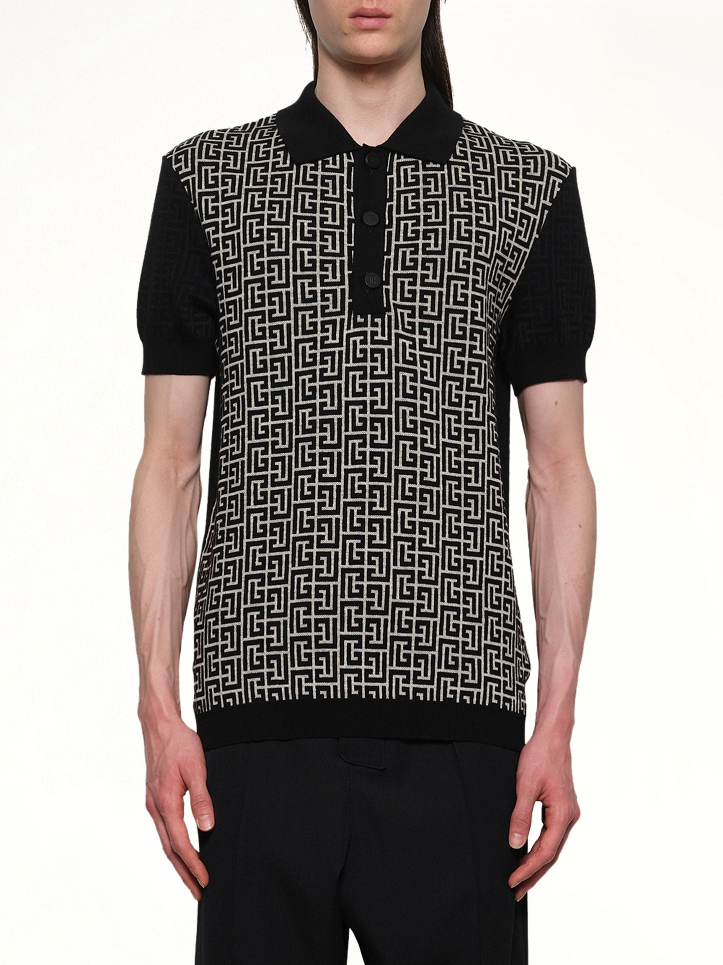 Image of a model wearing Tops. Productname: BALMAIN Mix Monogram Knit Polo in Ivory/Black colour by brand - BALMAIN