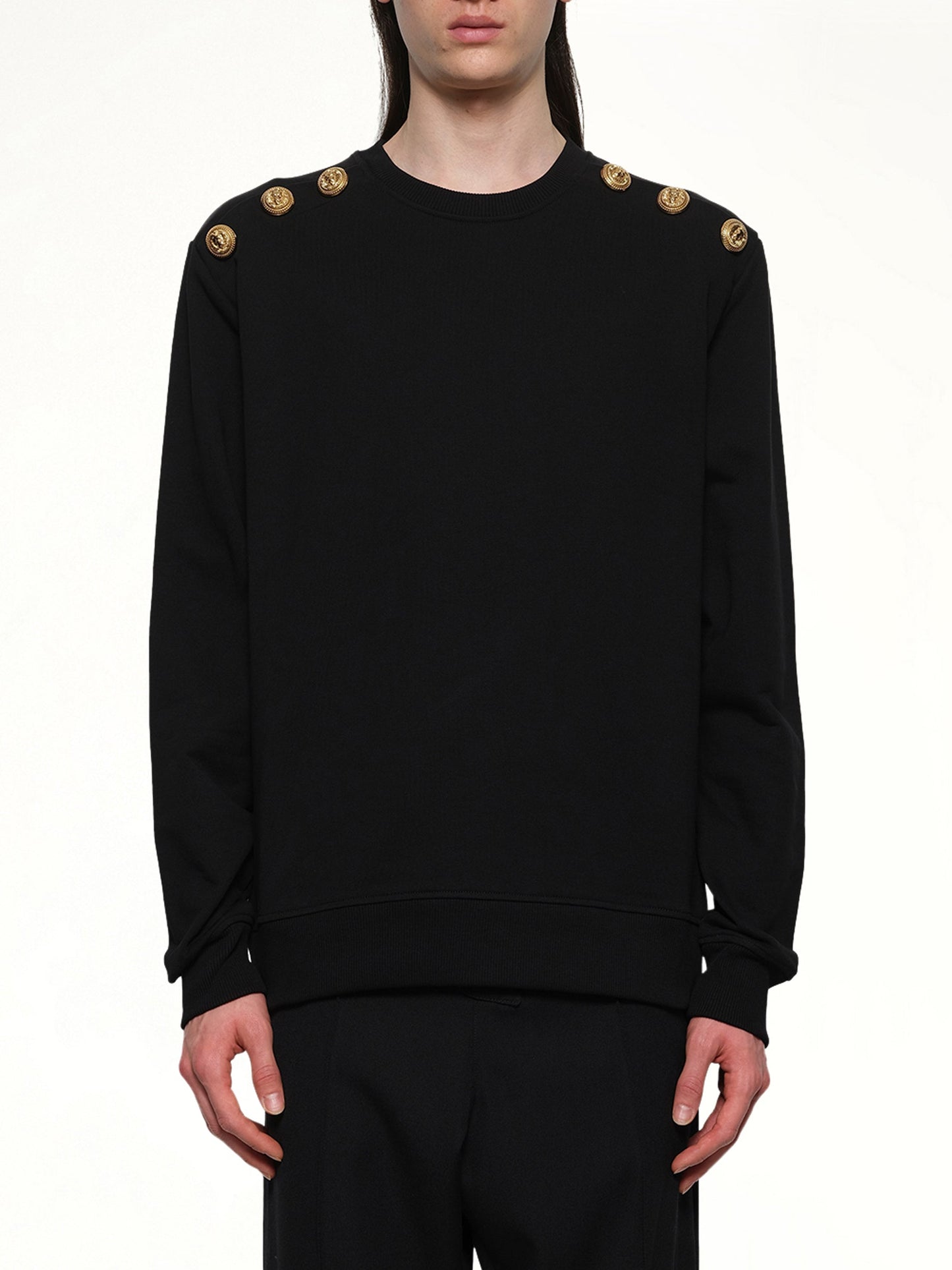Image of a model wearing Outerwear. Productname: BALMAIN 6 Shoulder Button Sweatshirt in BLACK colour by brand - BALMAIN
