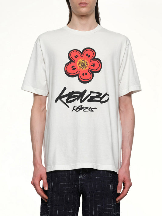 Image of a model wearing Tops. Productname: KENZO Kenzo Futura Classic T-Shirt in OFF WHITE colour by brand - KENZO