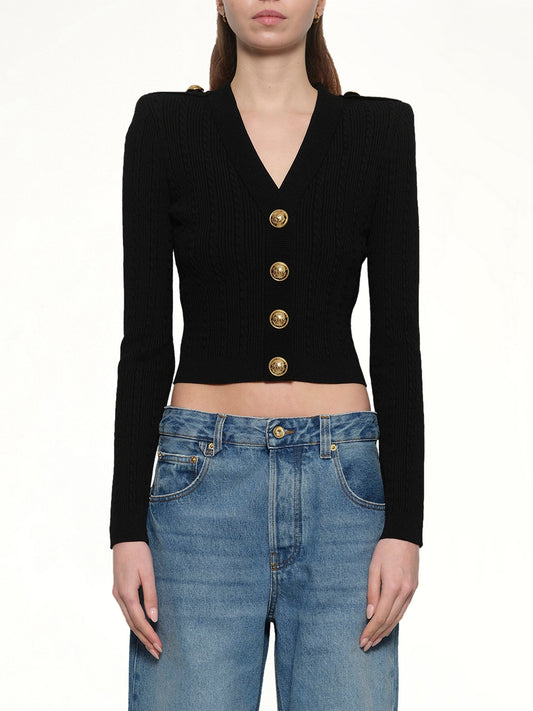 Image of a model wearing Outerwear. Productname: BALMAIN LS Buttoned V-Neck Torsade Knit Cardigan in Black colour by brand - BALMAIN