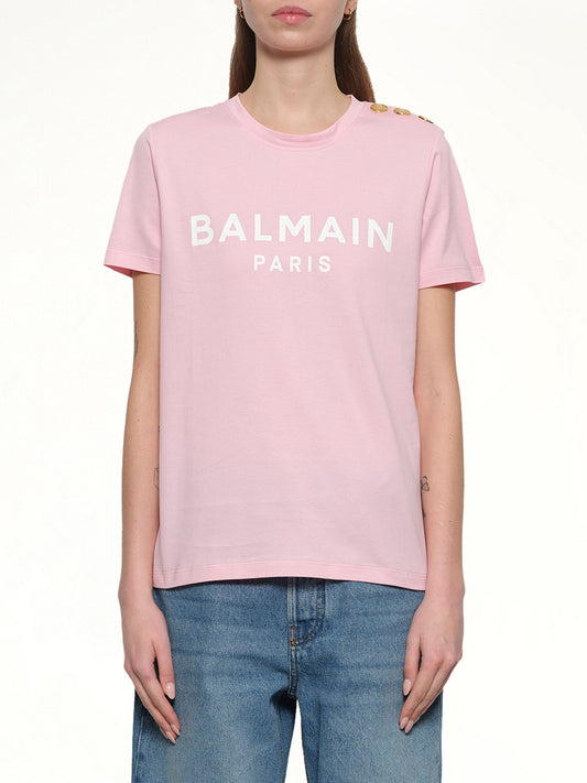 Image of a model wearing Tops. Productname: BALMAIN 3 BTN Balmain Printed T-Shirt in ROSE/WHITE colour by brand - BALMAIN