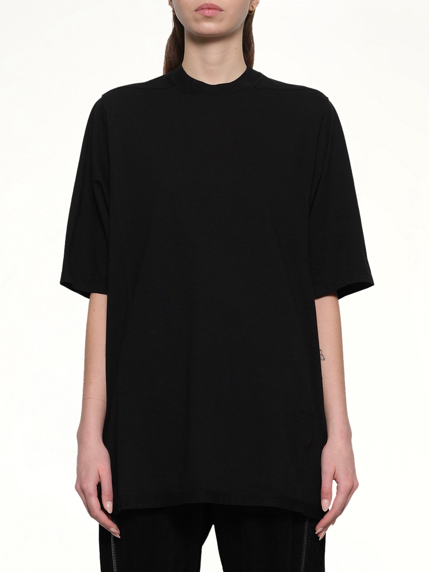 Image of a model wearing Tops. Productname: RICK OWENS DRKSHDW Jumbo SS T-Shirt in Black colour by brand - RICK OWENS DRKSHDW