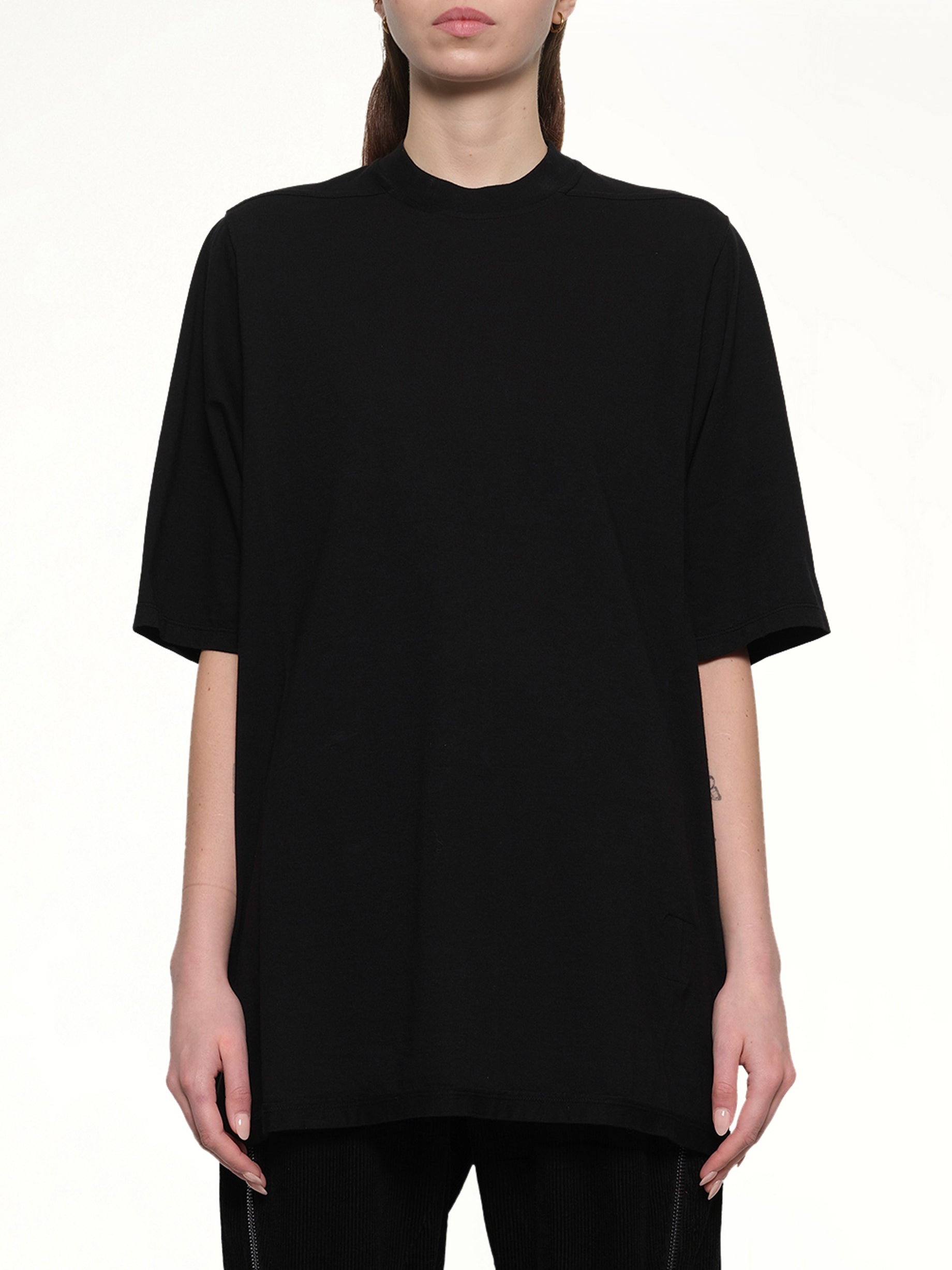 Image of a model wearing Tops. Productname: RICK OWENS DRKSHDW Jumbo SS T-Shirt in Black colour by brand - RICK OWENS DRKSHDW