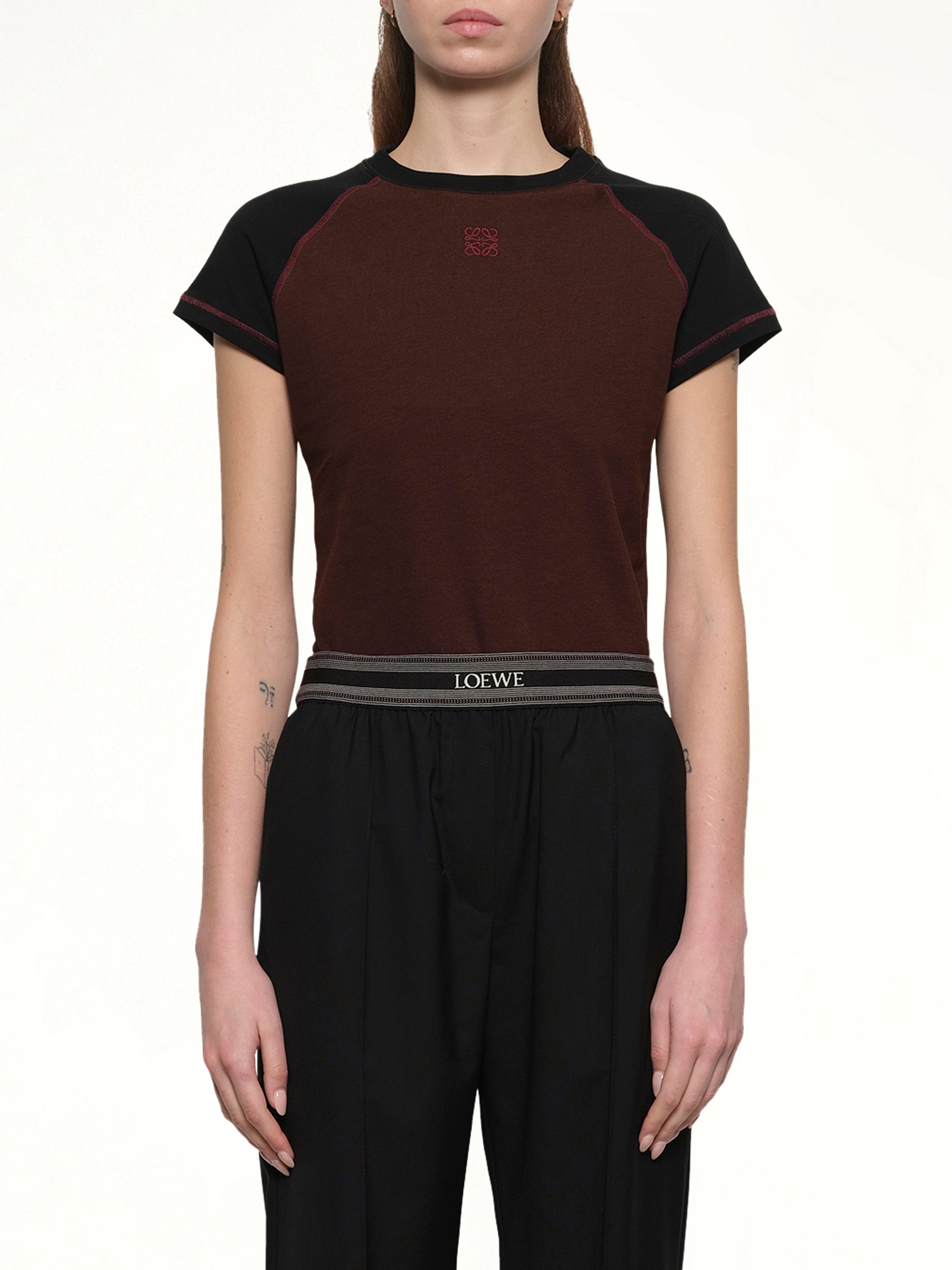 Image of a model wearing Tops. Productname: LOEWE Small Fit T-Shirt in BLACK/BURGUNDY colour by brand - LOEWE