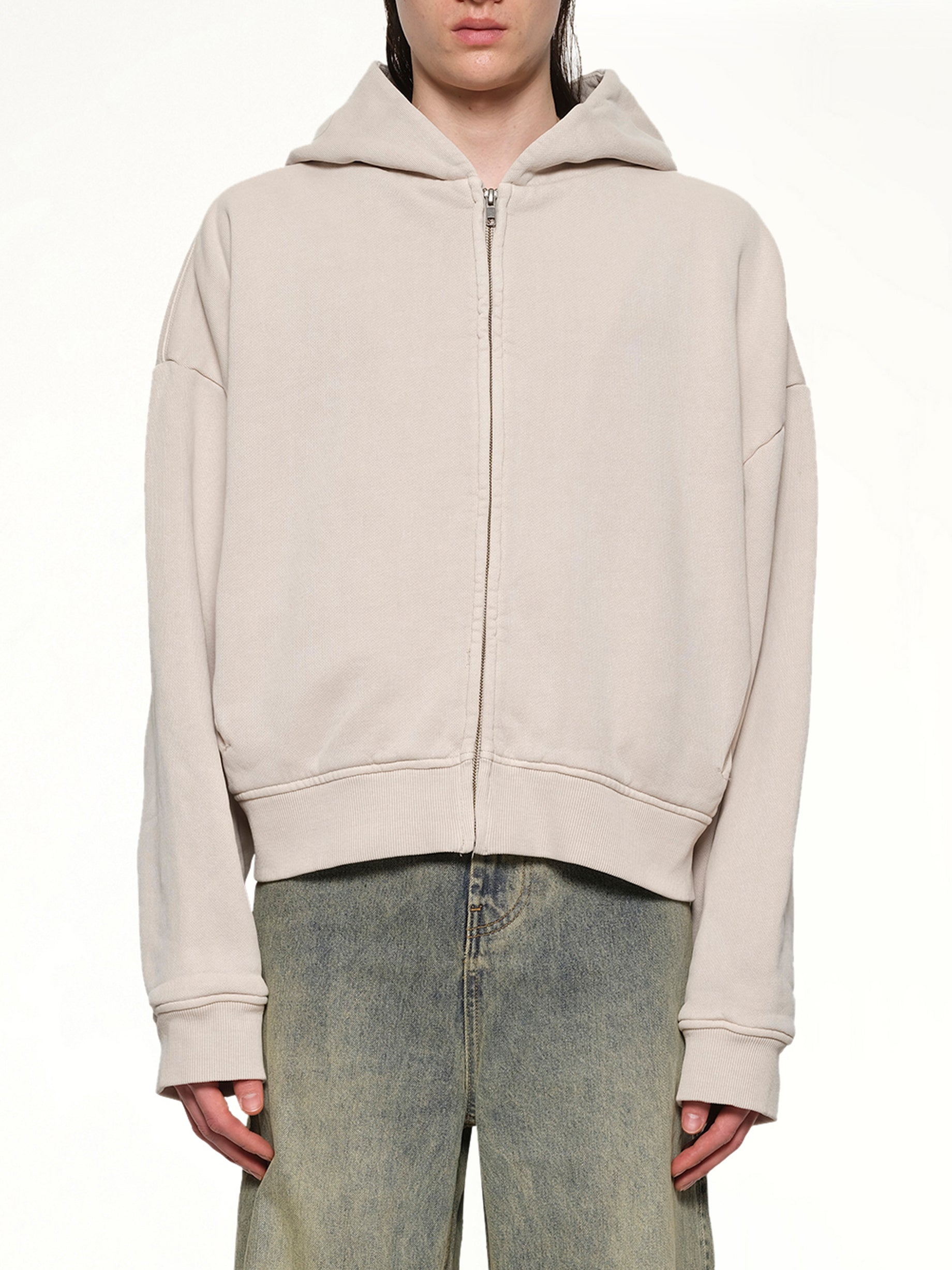 Image of a model wearing Outerwear. Productname: ENTIRE STUDIOS Thermal Hood in OFF WHITE colour by brand - ENTIRE STUDIOS