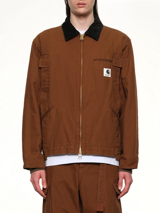 Image of a model wearing Outerwear. Productname: SACAI Carhartt WIP Duck Jacket in Dark Beige colour by brand - SACAI